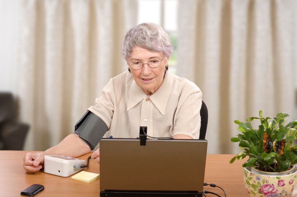 Older lady measuring blood pressure